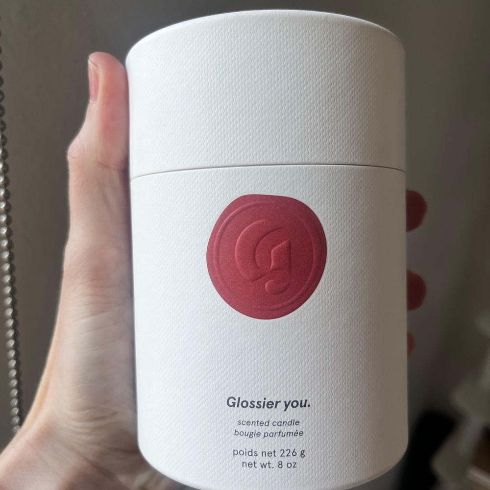Glossier White Candle with Red Emblem